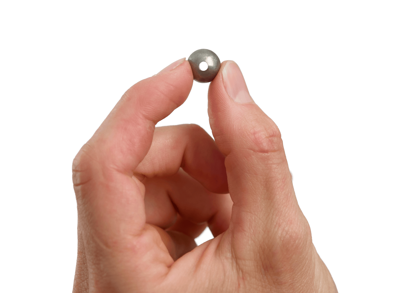 Close-up of a tumbled titanium bead